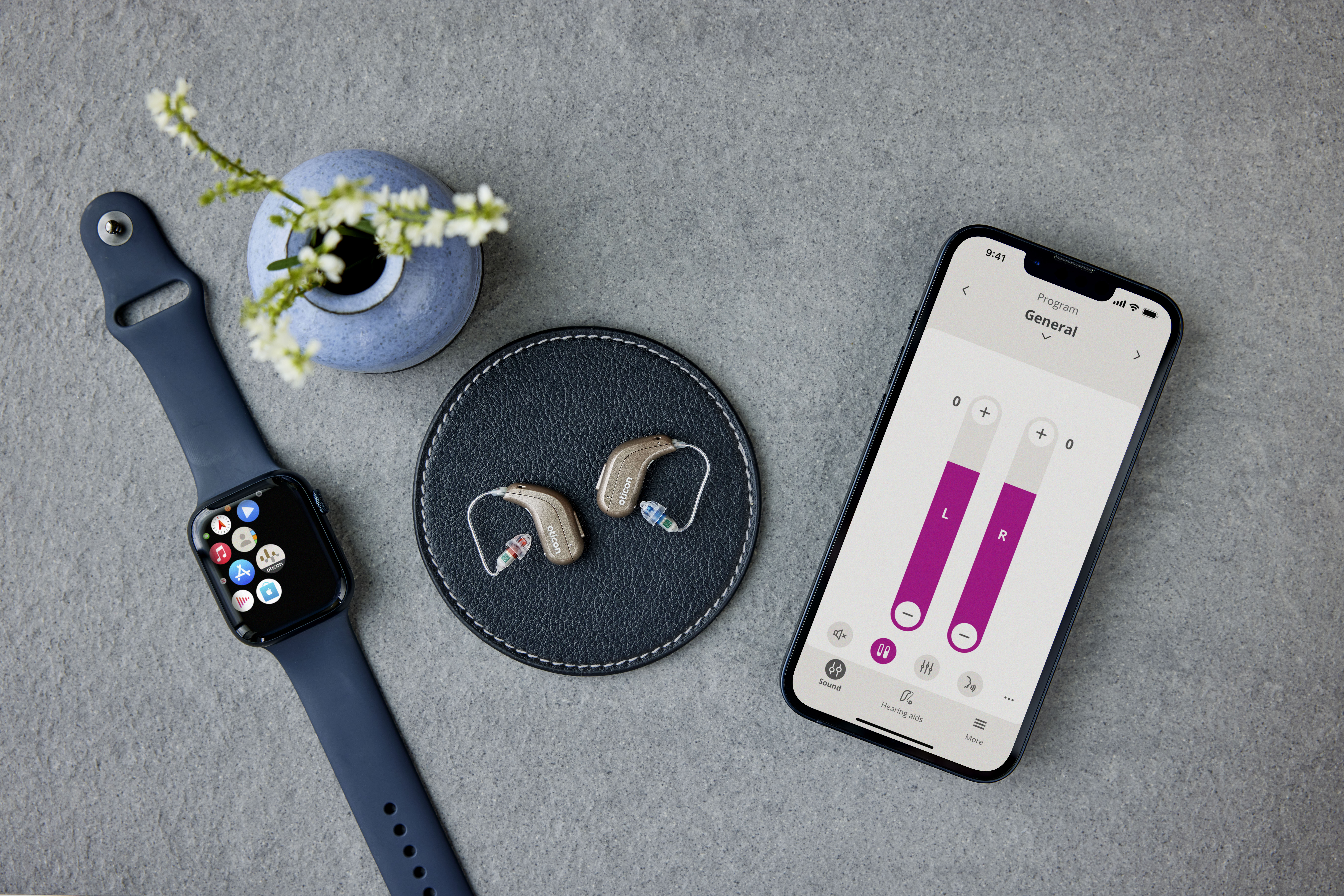 Oticon Intent connecting seamlessly with iPhone, iPad, and Apple Watch for direct streaming